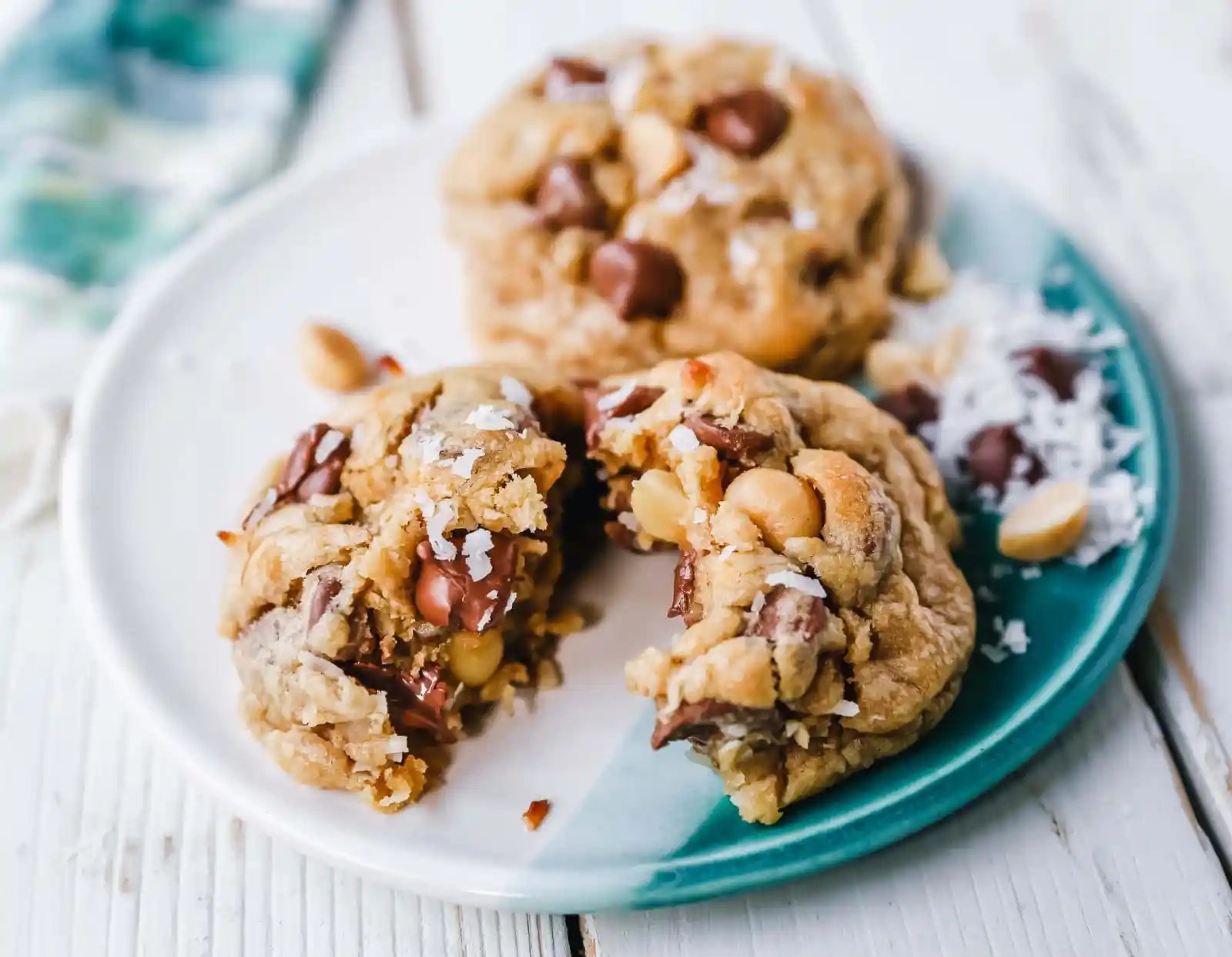 Milk Chocolate Chip Macadamia Nut Coconut Cookies Thick soft and chewy bakery-style milk chocolate chip macadamia nut coconut cookies are an Island favorite! www.modernhoney.com #cookies #chocolatechipmacadamianut