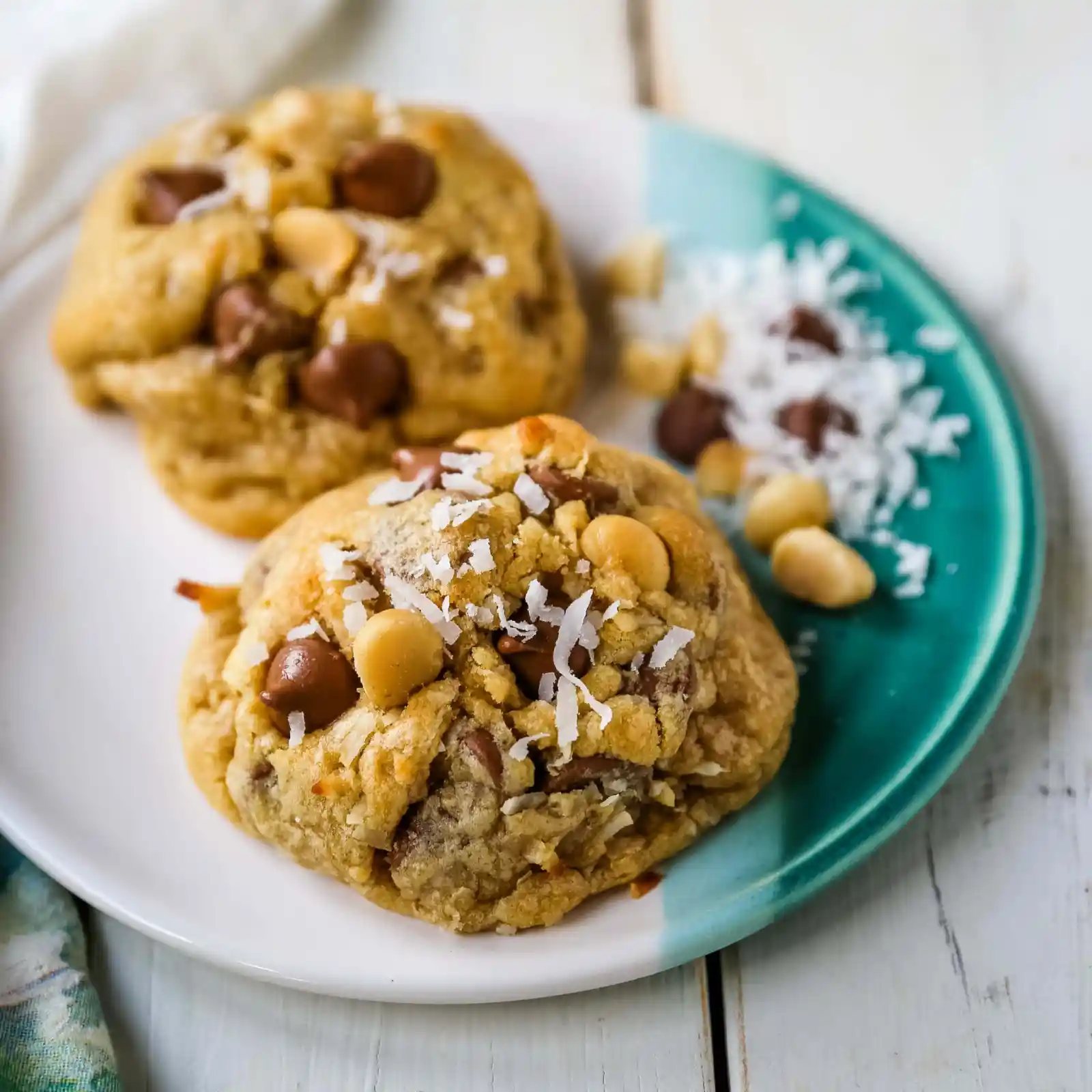 Milk Chocolate Chip Macadamia Nut Coconut Cookies Thick soft and chewy bakery-style milk chocolate chip macadamia nut coconut cookies are an Island favorite! www.modernhoney.com #cookies #chocolatechipmacadamianut