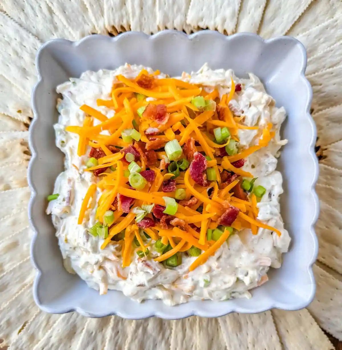 Crack Dip, also known as Million Dollar Dip, is a creamy, addictive party favorite made with a few simple and flavorful ingredients. The combination of cream cheese, cheddar, parmesan, bacon, ranch seasoning, and even jalapenos creates a combo that people can’t stop eating, which explains its catchy nickname—Crack Dip. Whether you're hosting a game night, family gathering, or looking for an easy, crowd-pleasing snack, this dip is bound to be a hit.