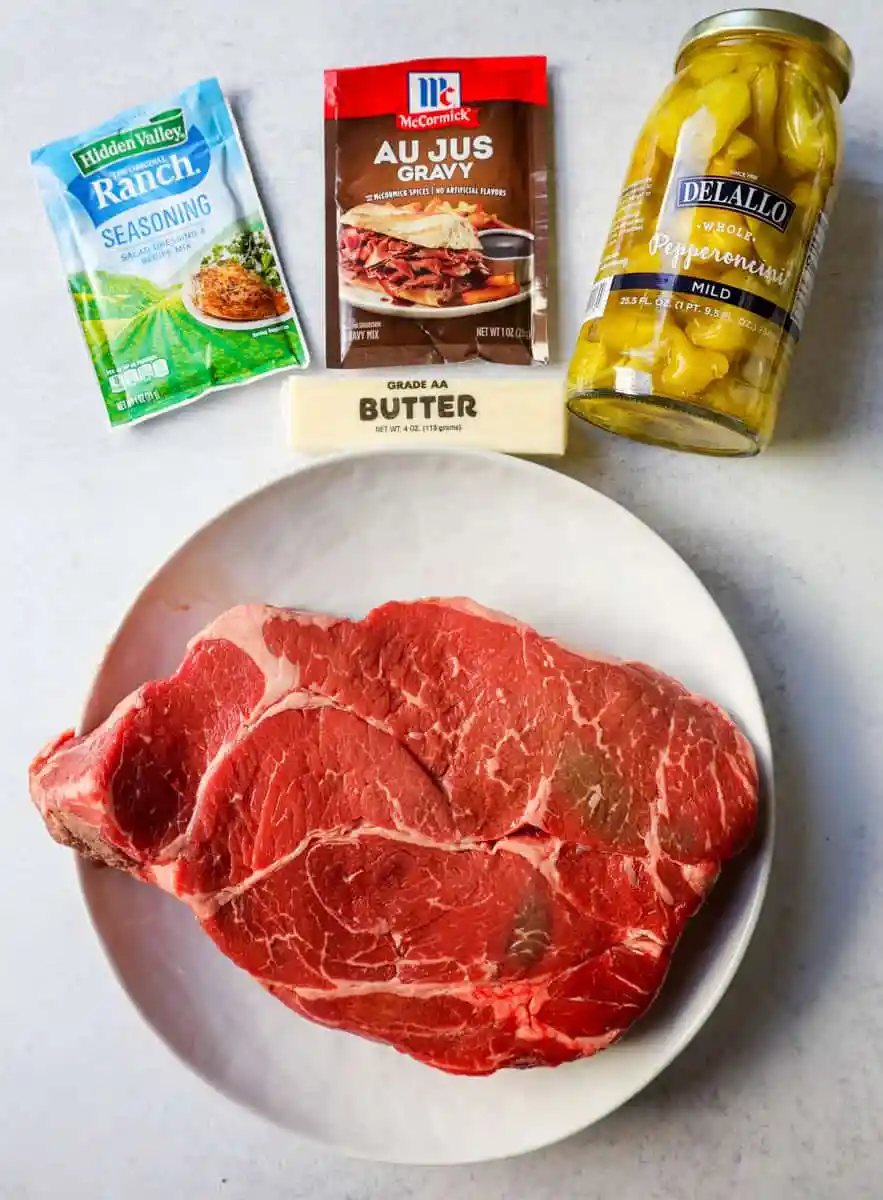 The best Mississippi pot roast recipe is made with only 5 simple ingredients and is the most flavorful and easiest beef roast you'll ever eat!