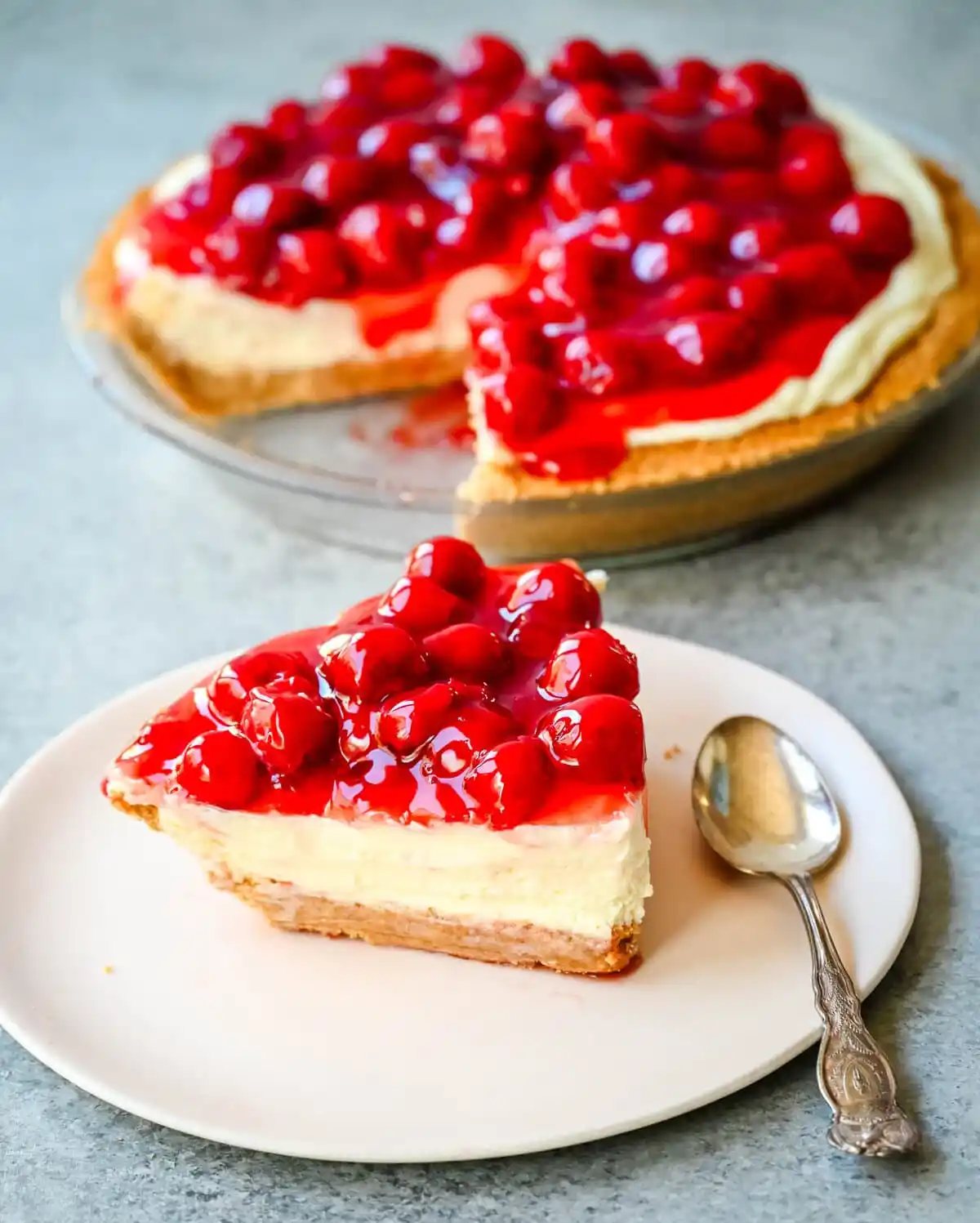 This easy No-Bake Cheesecake Recipe is made with a luscious filling made with sweetened condensed milk, cream cheese, and lemon juice, all piled onto a homemade graham cracker crust. This No Bake Cheesecake with sweetened condensed milk is perfect for when you want an effortless dessert that is easy to whip up and always a crowd pleaser.