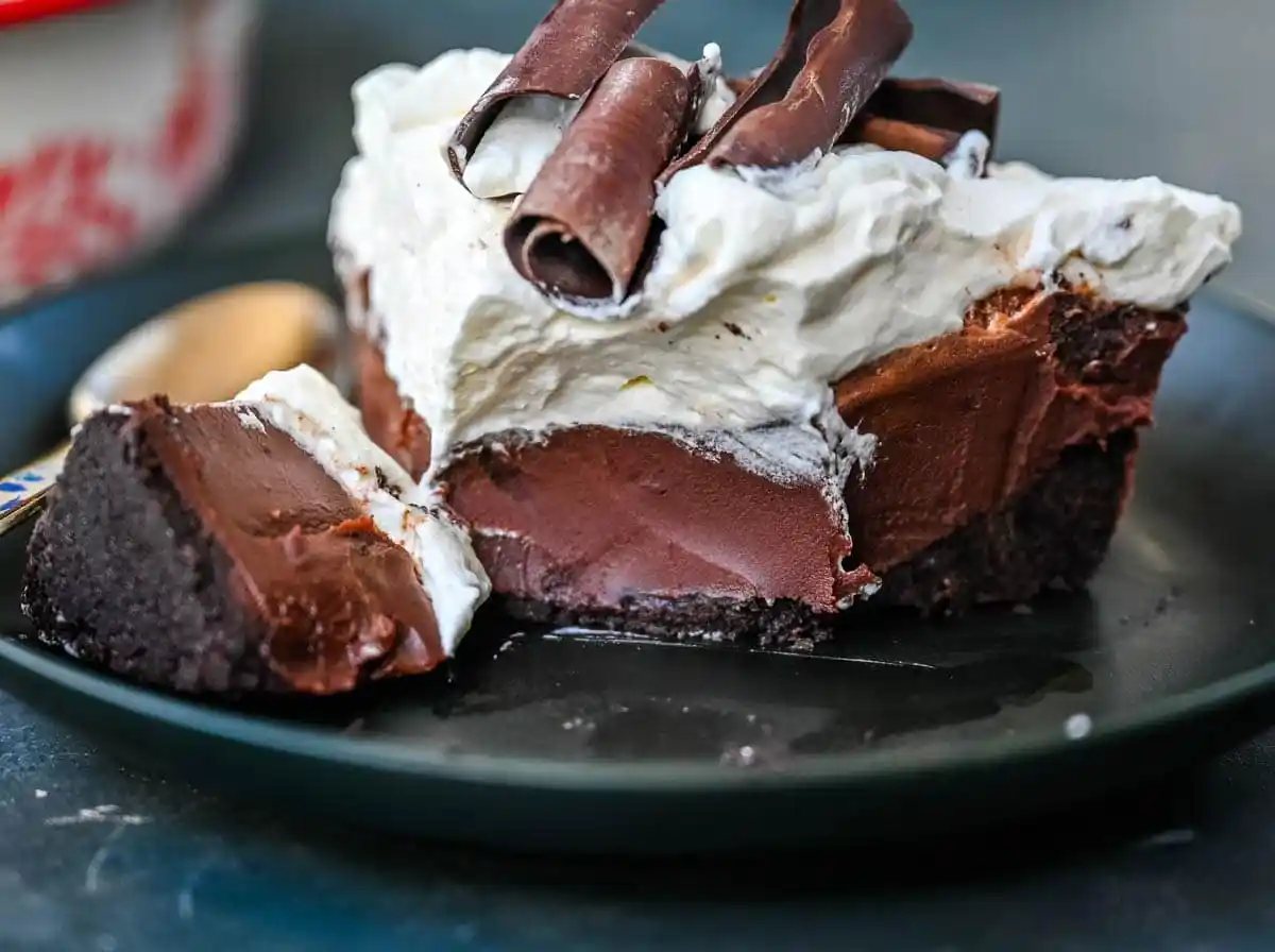 This No Bake Chocolate Cream Pie is made with a buttery Oreo crust holding a luscious chocolate ganache filling topped with sweetened whipped cream. Made with just a handful of ingredients, it’s creamy, chocolatey, and totally foolproof. An easy Chocolate Cream Pie recipe!