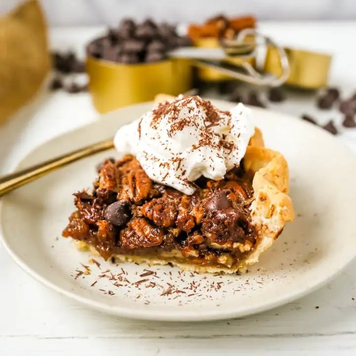Chocolate Pecan Pie Rich chocolate pecan pie made with a brown sugar filling, crunchy pecans, rich chocolate, all in a homemade buttery, flaky pie crust. www.modernhoney.com #pie #pecanpie #chocolatepecanpie #thanksgiving #pies