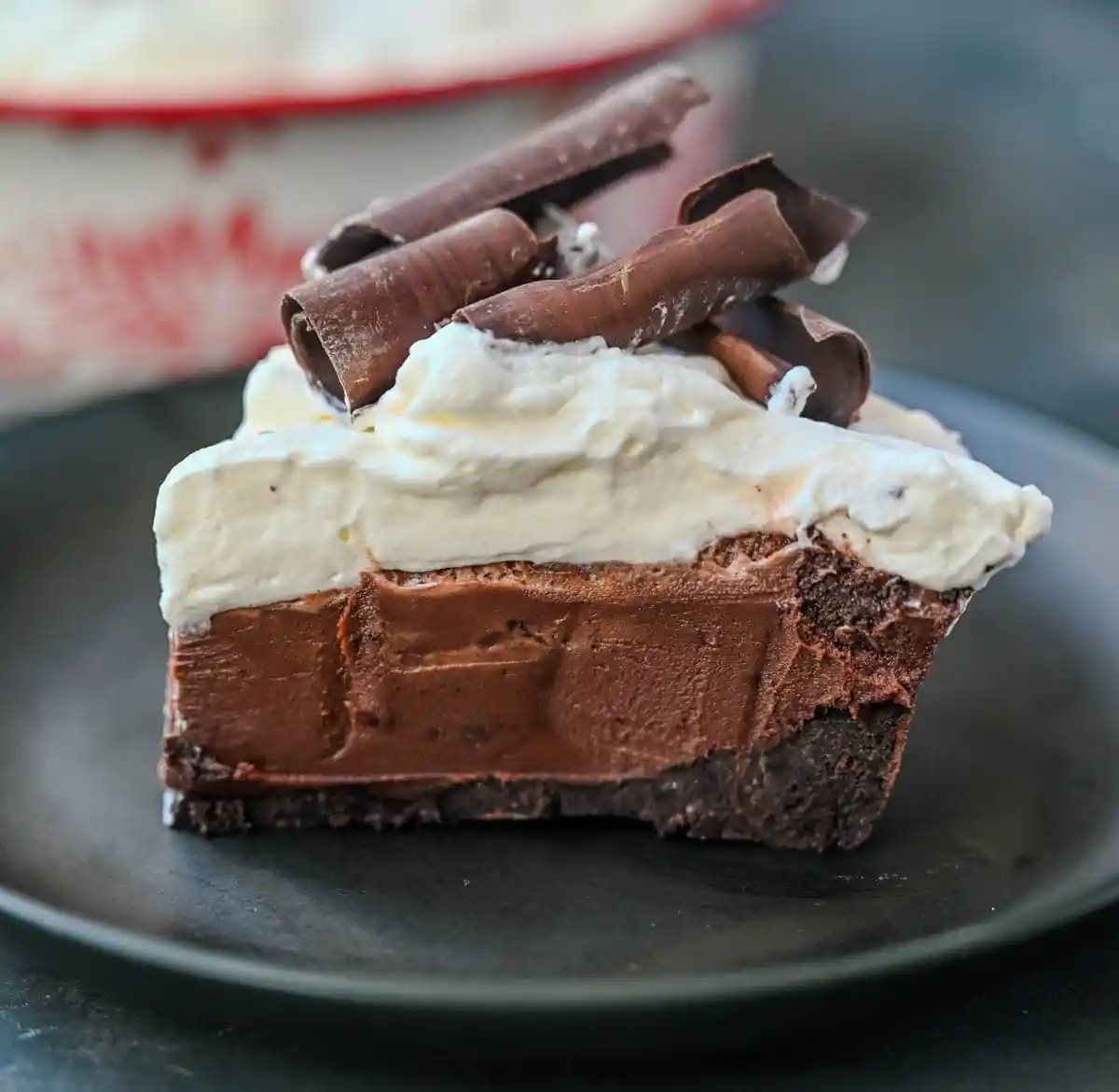 This No Bake Chocolate Cream Pie is made with a buttery Oreo crust holding a luscious chocolate ganache filling topped with sweetened whipped cream. Made with just a handful of ingredients, it’s creamy, chocolatey, and totally foolproof. An easy Chocolate Cream Pie recipe!