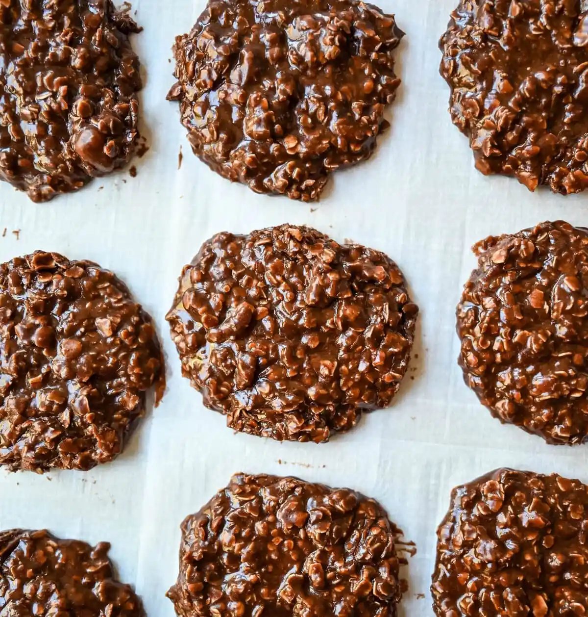 These classic No-Bake Cookies are a quick, nostalgic treat that satisfies a chocolate-peanut butter craving without ever turning on the oven. These easy no-bake cookies are fudgy, chewy, and rich yet take only minutes to make. All you need are 8 ingredients, a saucepan, and a spoon to make the Best No-Bake Cookies.