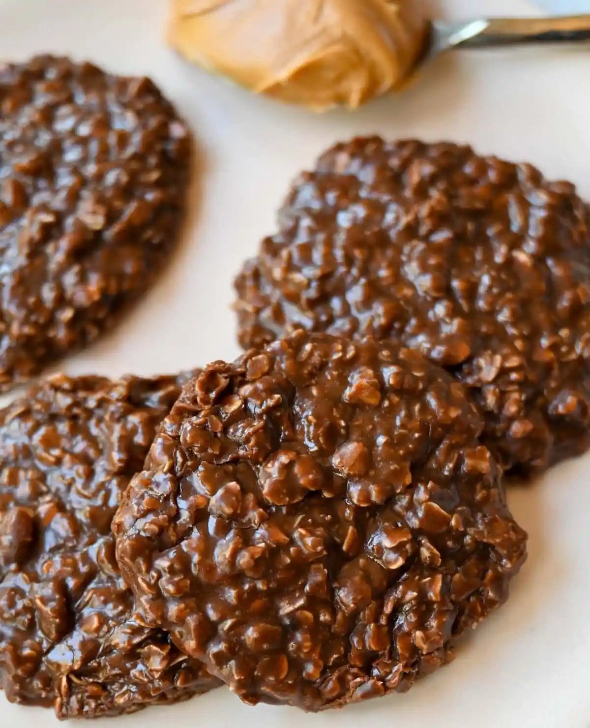 These classic No-Bake Cookies are a quick, nostalgic treat that satisfies a chocolate-peanut butter craving without ever turning on the oven. These easy no-bake cookies are fudgy, chewy, and rich yet take only minutes to make. All you need are 8 ingredients, a saucepan, and a spoon to make the Best No-Bake Cookies.