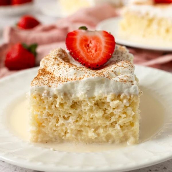 Tres Leches Cake. A classic Mexican dessert made with a vanilla sponge cake soaked with three kinds of milk -- heavy cream, evaporated milk and sweetened condensed milk and topped with fresh sweetened whipped cream. An authentic Mexican dessert recipe!