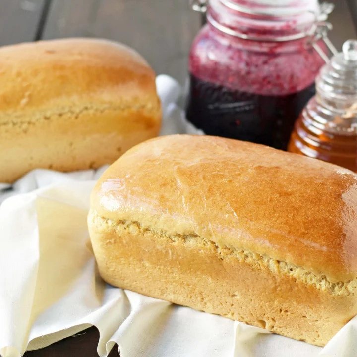Best Homemade One Hour Whole Wheat Bread. Healthy homemade whole wheat bread made in one hour. Warm bread made from scratch using simple ingredients. No sugar added whole wheat bread recipe. www.modernhoney.com