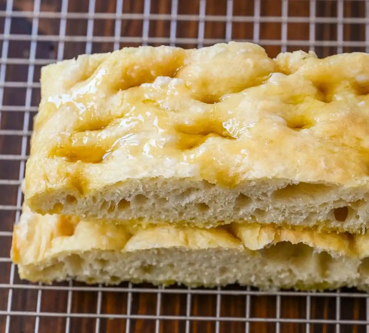 This no-knead focaccia bread is soft, fluffy on the inside, and perfectly golden and crisp on the outside with minimal effort. Made with simple pantry staples, this easy focaccia recipe uses a stretch-and-fold method instead of kneading, making it perfect for beginners. If you’re looking for an easy homemade focaccia bread recipe, this one delivers bakery-quality results every time.