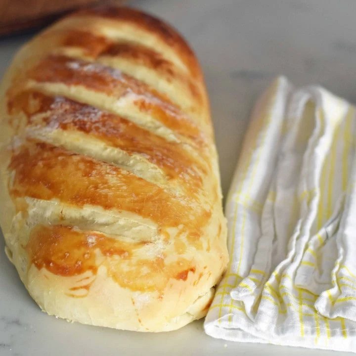 Easy Homemade Bakery French Bread. Quick and easy homemade french bread made at home. Kids can make this bread! Super easy to follow foolproof recipe. www.modernhoney.com