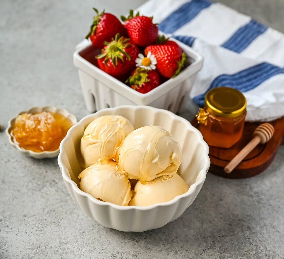 This homemade honey ice cream recipe features a rich, creamy texture with the natural sweetness of real honey and no added refined sugars. This is such a nourishing ice cream recipe with dried milk powder and egg yolks for extra protein and rich custard flavor. This Walt's Dream Ice cream is healthier version of homemade ice cream!