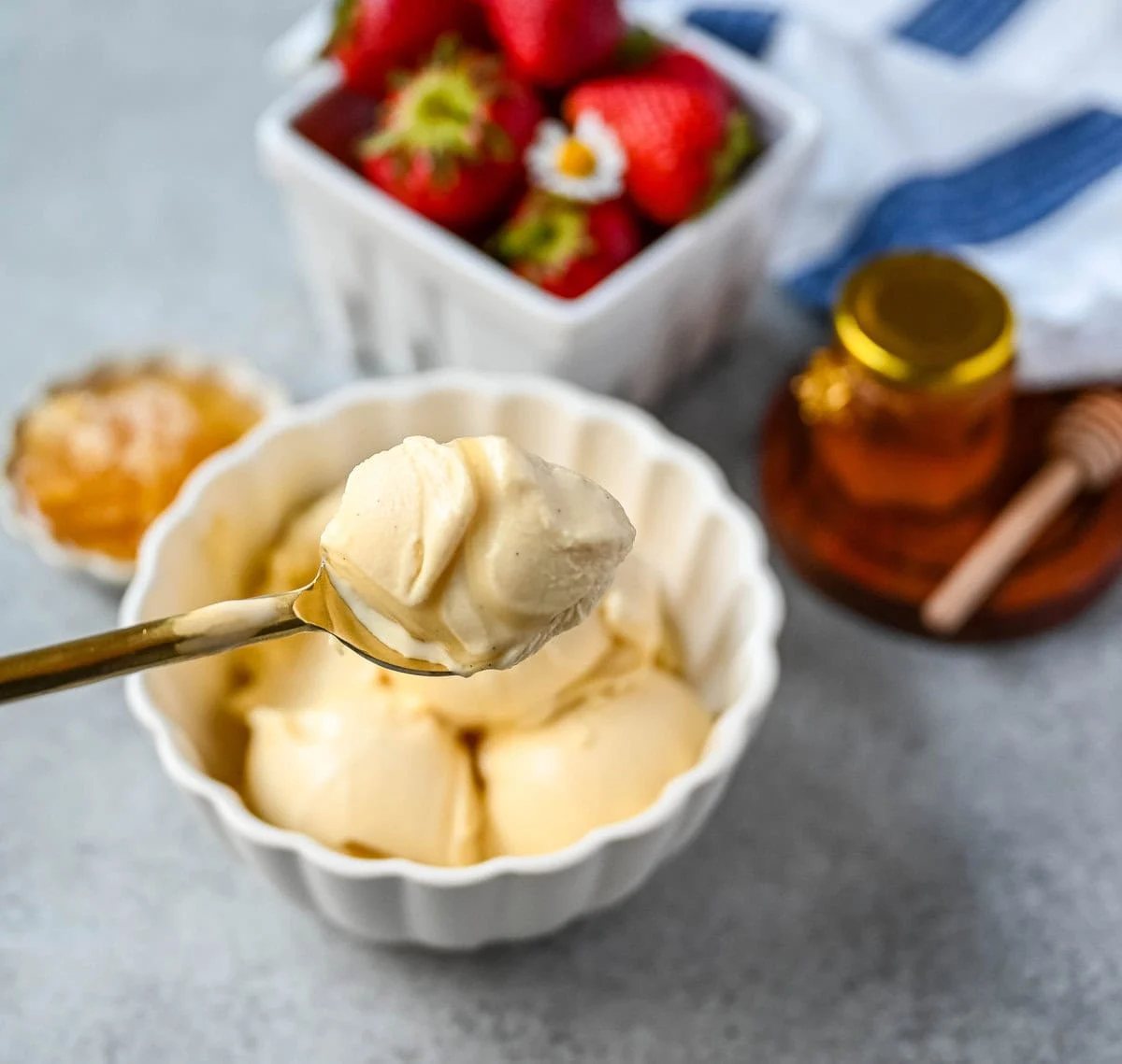 This homemade honey ice cream recipe features a rich, creamy texture with the natural sweetness of real honey and no added refined sugars. This is such a nourishing ice cream recipe with dried milk powder and egg yolks for extra protein and rich custard flavor. This Walt's Dream Ice cream is healthier version of homemade ice cream!