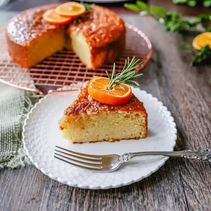 Olive Oil Cake A homemade olive oil cake with vanilla and almond extracts and topped with a glaze. This vanilla olive oil cake is the perfect simple dessert.