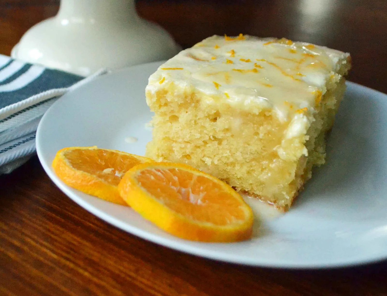 Orange Roll Breakfast Cake. A sweet orange cake with three layers of flavor -- a moist cake topped with a buttery orange topping and a sweet orange cream cheese glaze. The most amazing orange cake! Perfect for a holiday breakfast or dessert. www.modernhoney.com. Plus a wonderful egg nog and ice cream drink recipe.