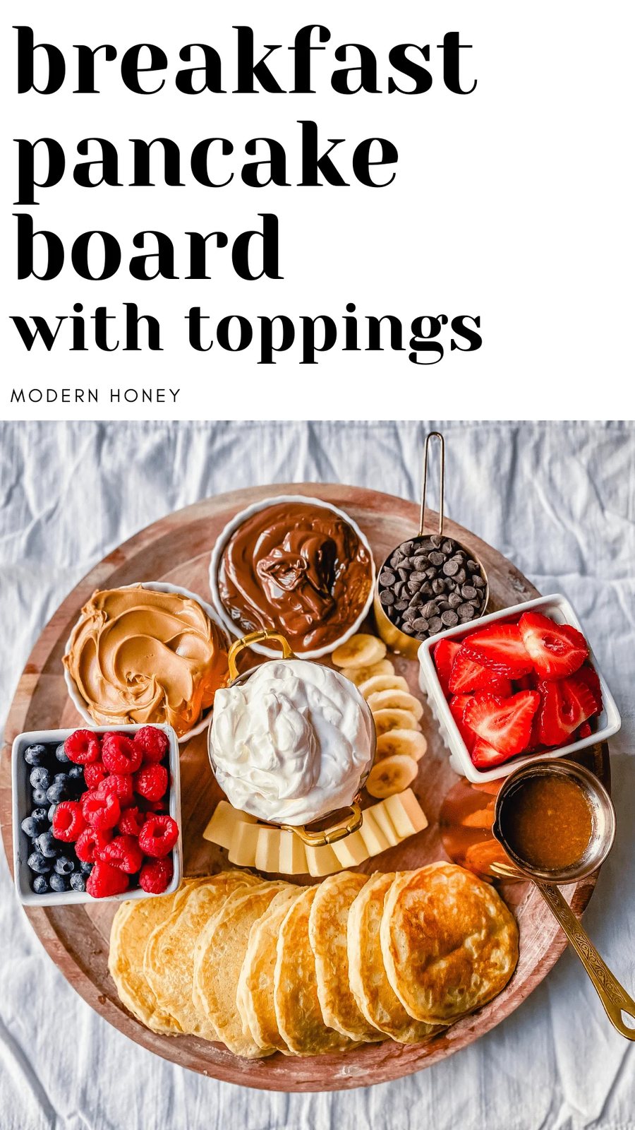 Breakfast Pancake Board. The perfect breakfast for entertaining! Homemade buttermilk pancakes topped with all of your favorite toppings -- fresh berries, whipped cream, homemade syrup, Nutella, chocolate chips, peanut butter, and more.