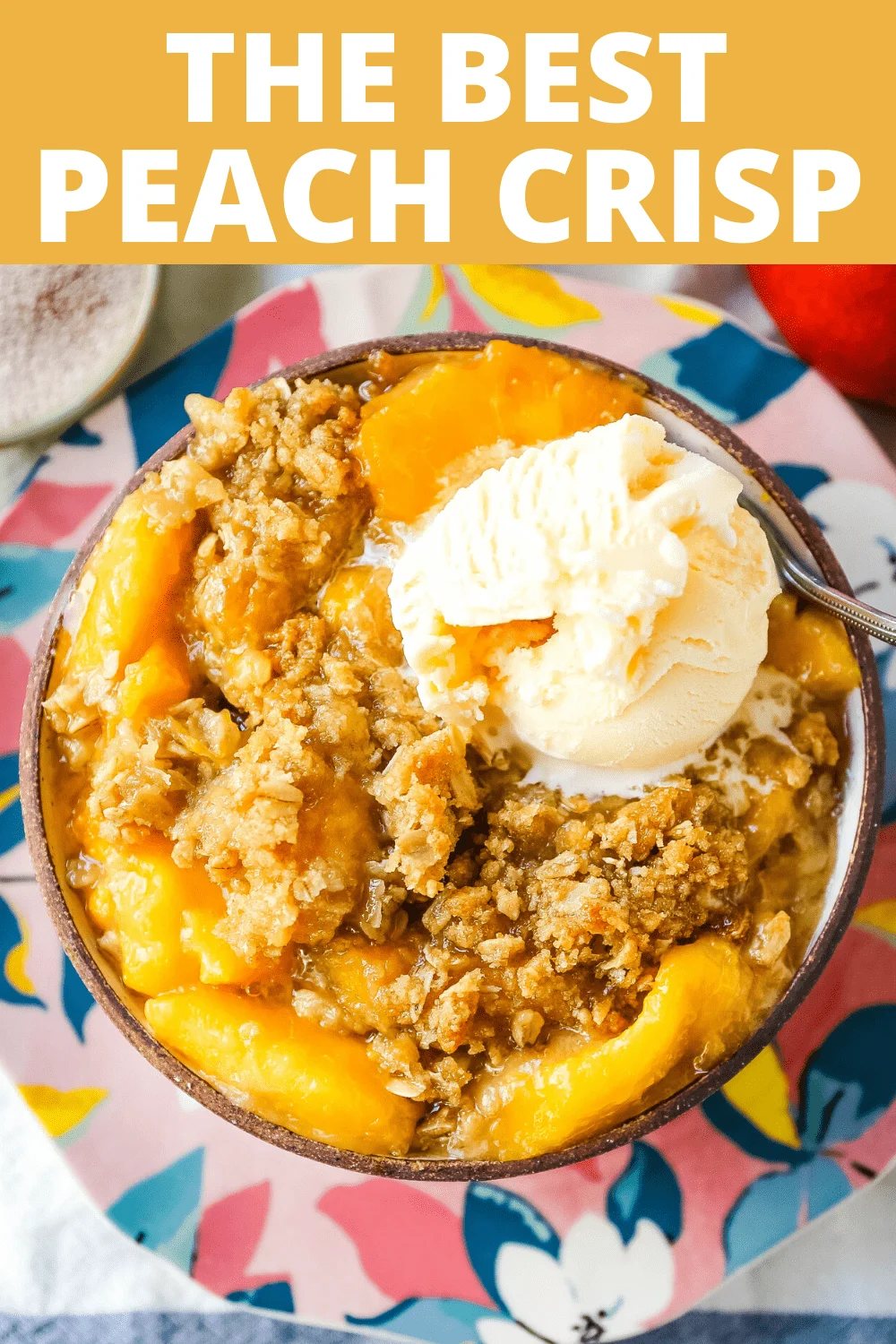 Peach Crisp. Fresh sweetened peaches with a brown sugar oat crumble topping with creamy vanilla ice cream. The perfect summer dessert! www.modernhoney.com #peach #peaches #peachcrisp #peachrecipes #peachdessert