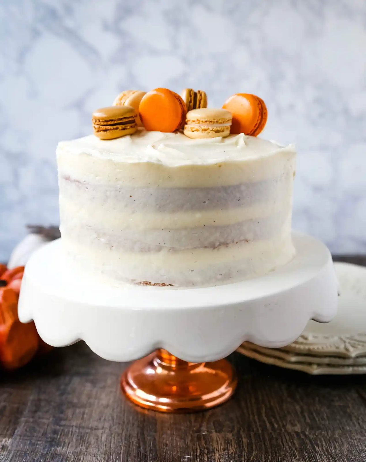 Pumpkin Cake with Cream Cheese Frosting Moist Pumpkin Spiced Cake with a Sweet Cream Cheese Frosting. The best Fall pumpkin layered cake recipe! www.modernhoney.com #pumpkin #pumpkinrecipes #fall #ffallrecipes #pumpkincake
