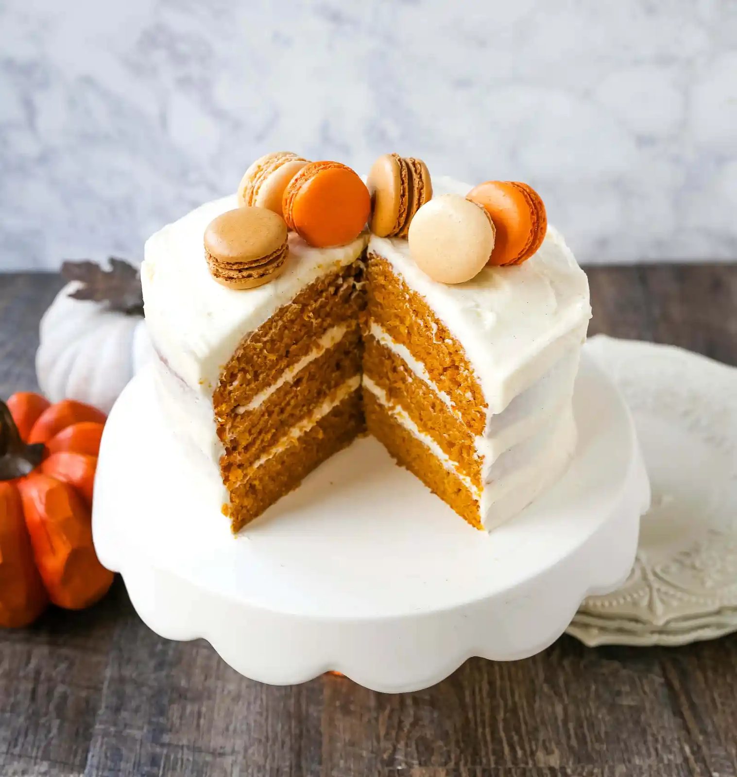 Pumpkin Cake with Cream Cheese Frosting Moist Pumpkin Spiced Cake with a Sweet Cream Cheese Frosting. The best Fall pumpkin layered cake recipe! www.modernhoney.com #pumpkin #pumpkinrecipes #fall #ffallrecipes #pumpkincake