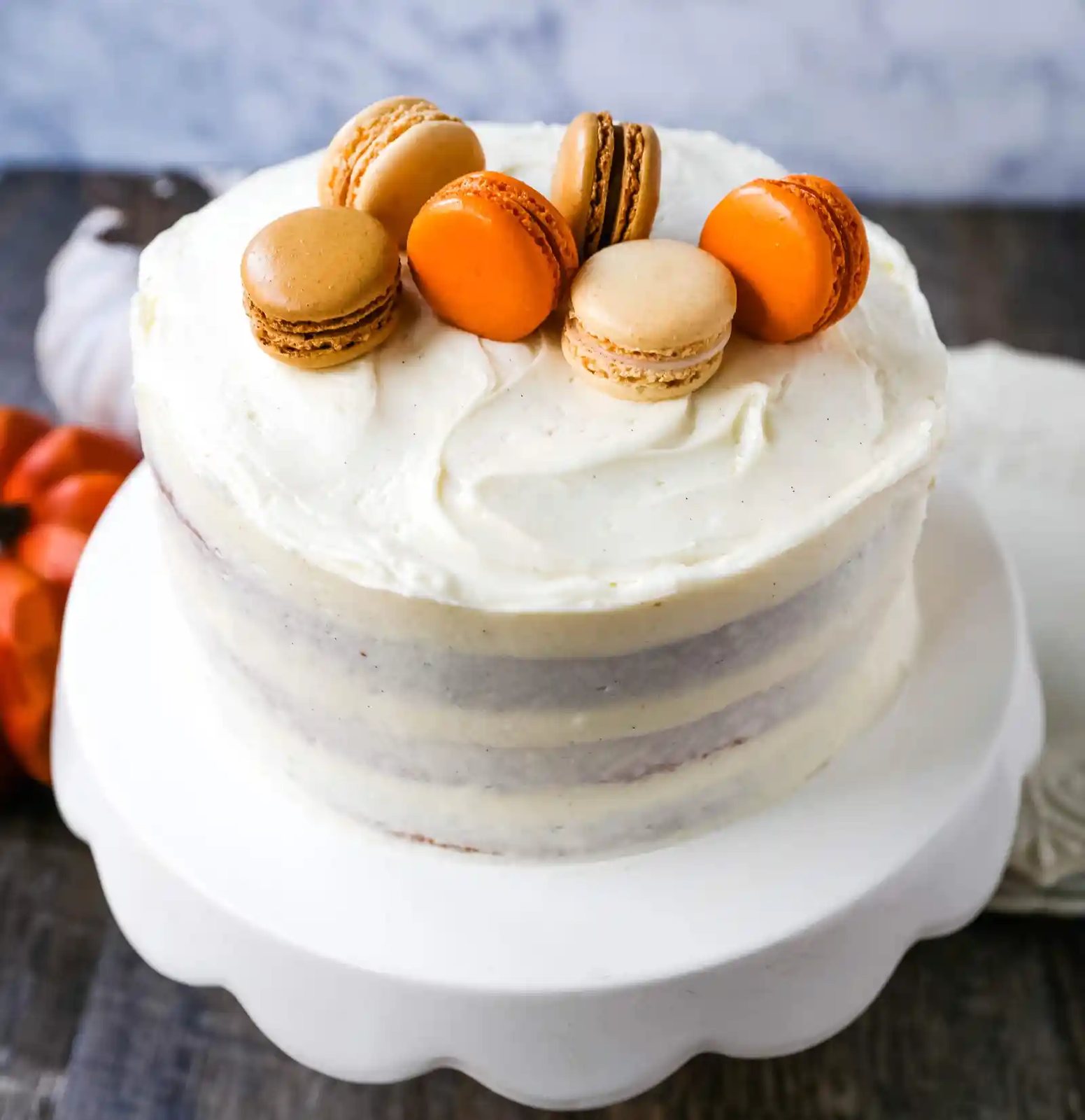 Pumpkin Cake with Cream Cheese Frosting Moist Pumpkin Spiced Cake with a Sweet Cream Cheese Frosting. The best Fall pumpkin layered cake recipe! www.modernhoney.com #pumpkin #pumpkinrecipes #fall #ffallrecipes #pumpkincake