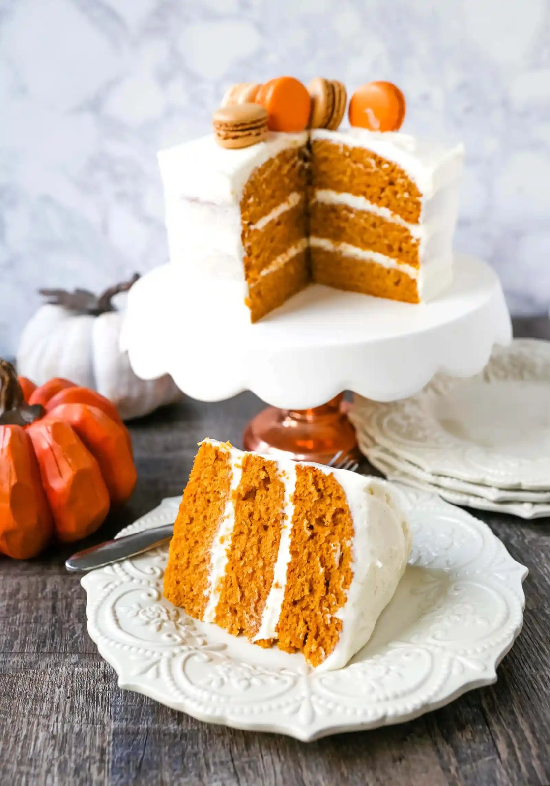 Pumpkin Cake with Cream Cheese Frosting Moist Pumpkin Spiced Cake with a Sweet Cream Cheese Frosting. The best Fall pumpkin layered cake recipe! www.modernhoney.com #pumpkin #pumpkinrecipes #fall #ffallrecipes #pumpkincake