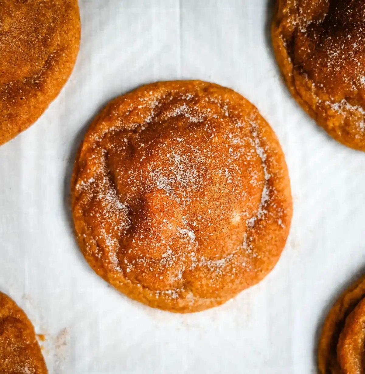 These soft, chewy, pumpkin spice cookies are filled with a cheesecake filling. They are the perfect pumpkin cookie filled with a sweet cream cheese center and rolled into cinnamon sugar. You will love this Best Pumpkin Cheesecake Cookie Recipe!