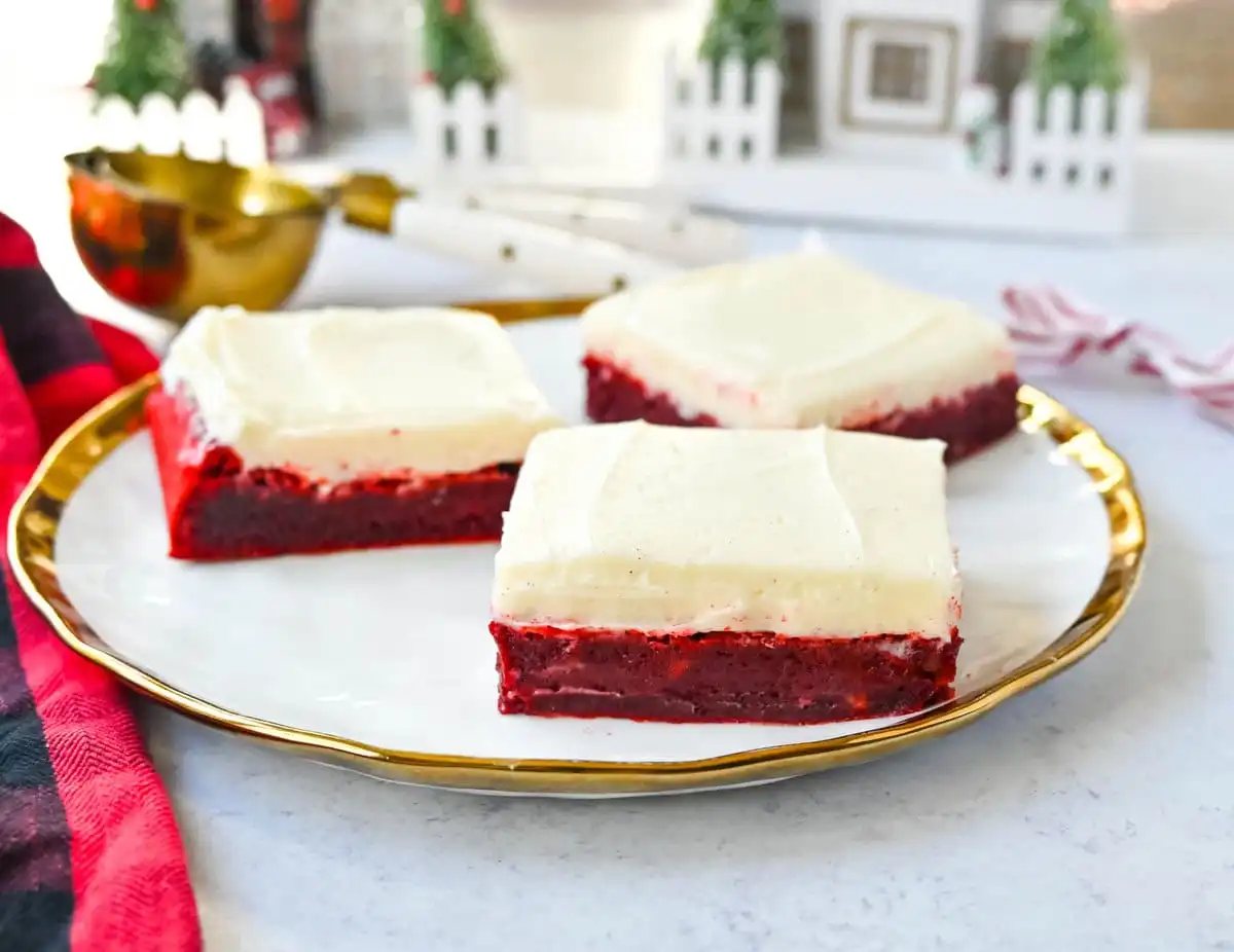 Red velvet brownies are a decadent twist on the classic red velvet cake, combining the color, subtle cocoa flavor, and creamy texture into the perfect brownies. These homemade Red Velvet Brownies with a sweet cream cheese frosting are fudgy and rich with a tangy and sweet cream cheese frosting.