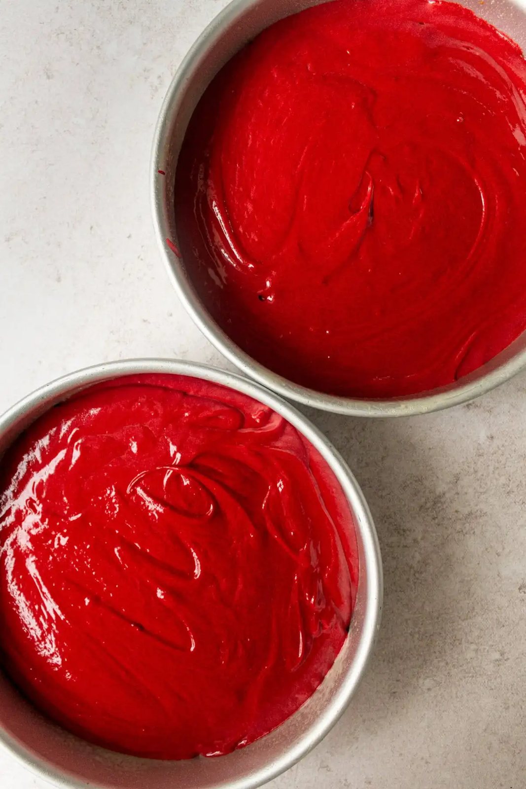 Red Velvet Cake in cake pans before baking