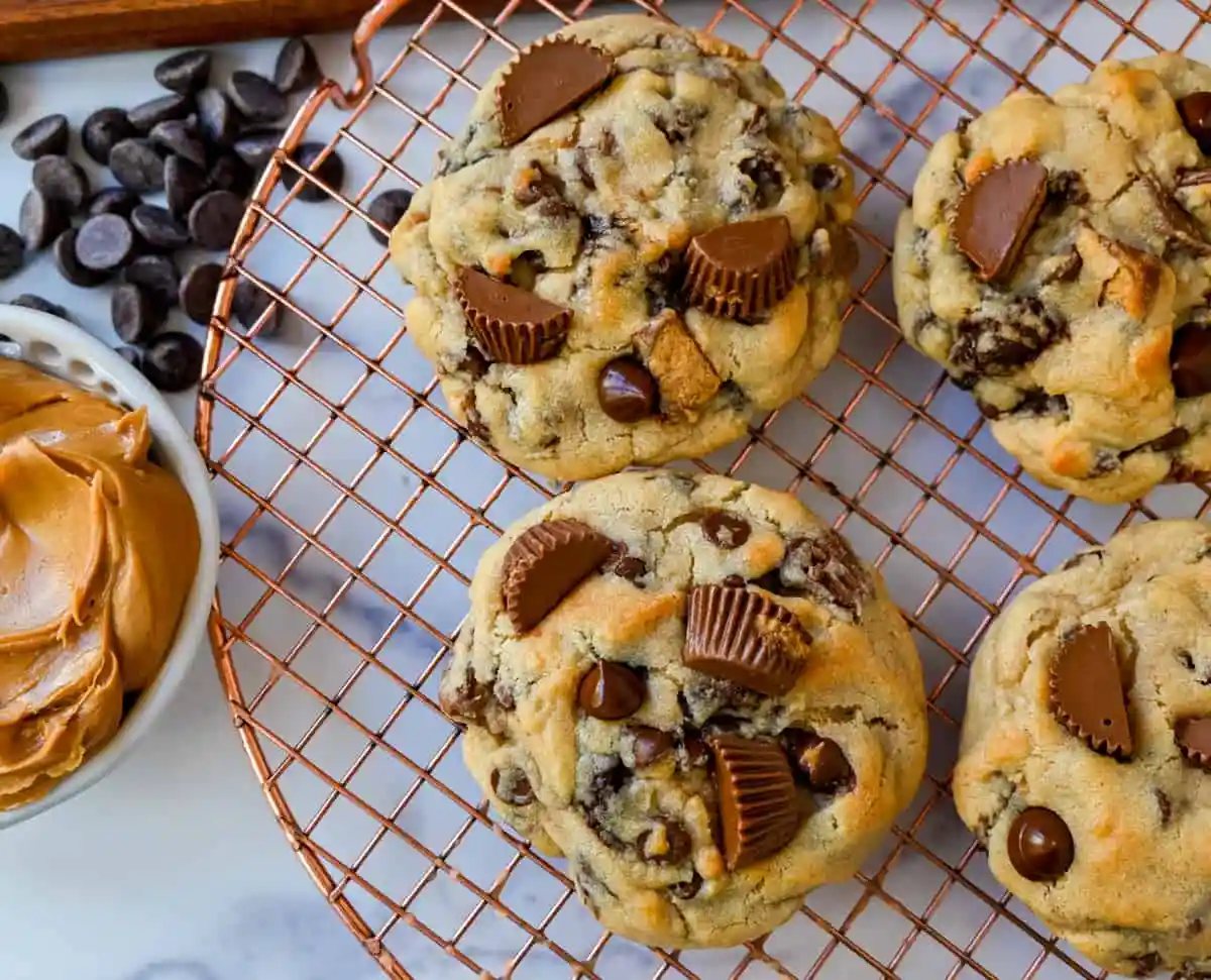 Reese's Chocolate Peanut Butter Cup Cookies. Soft, chewy, thick bakery-style chocolate peanut butter cup cookies made with Reese's peanut butter cups. Chocolate peanut butter lovers will love these cookies!