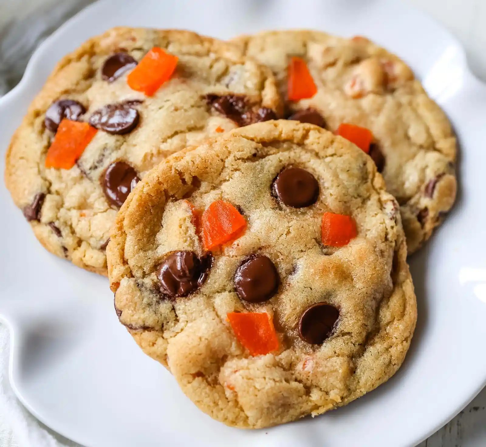 Dark Chocolate Mango Cookies Chewy citrus cookies with dark chocolate chunks and sweet dried mango. A rich tropical cookie!