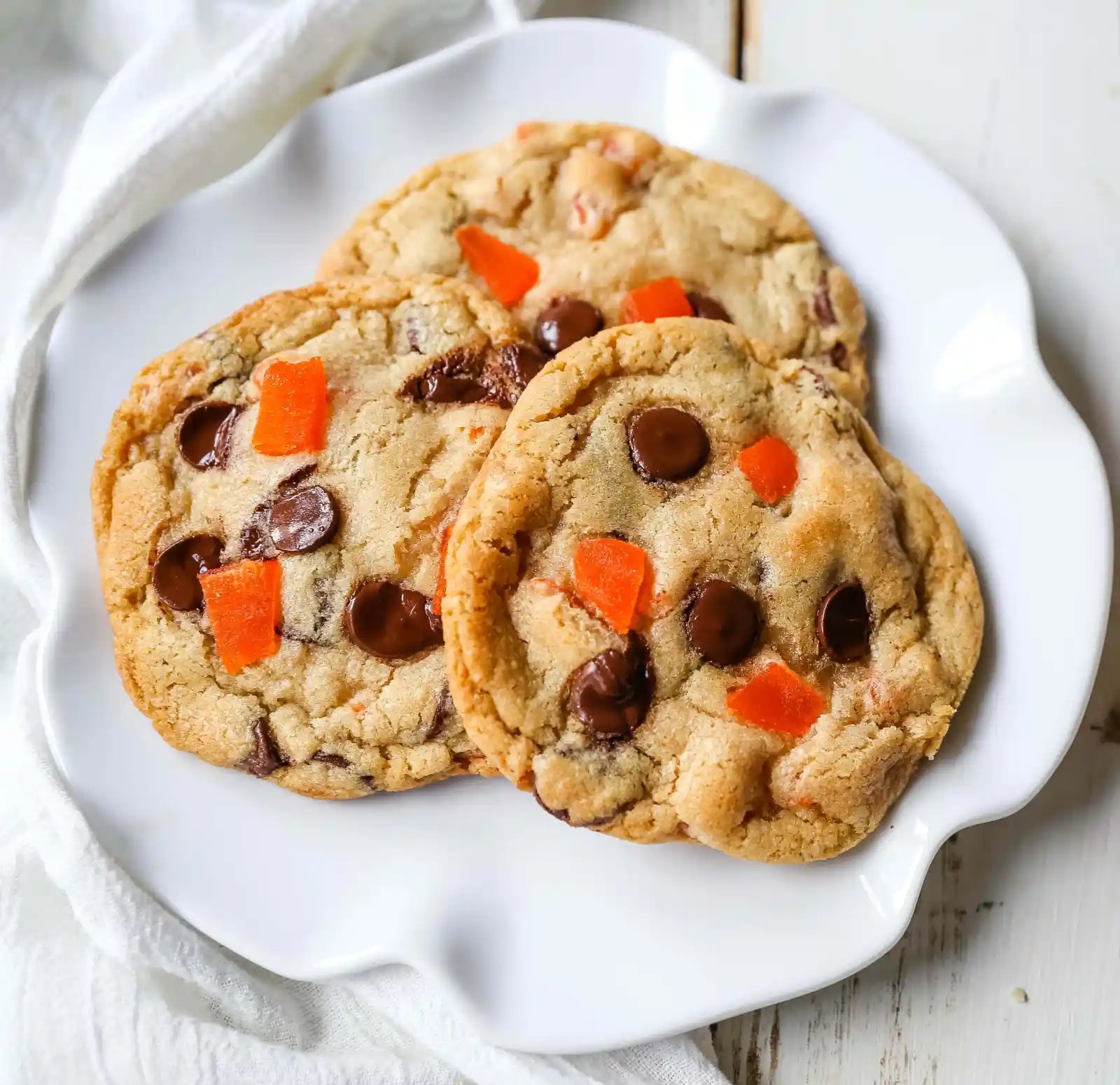 Dark Chocolate Mango Cookies Chewy citrus cookies with dark chocolate chunks and sweet dried mango. A rich tropical cookie!