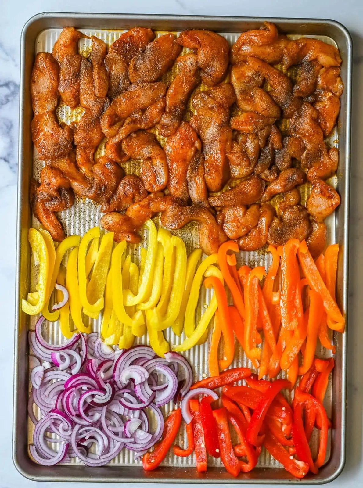 sheet pan chicken fajitas before cooking
