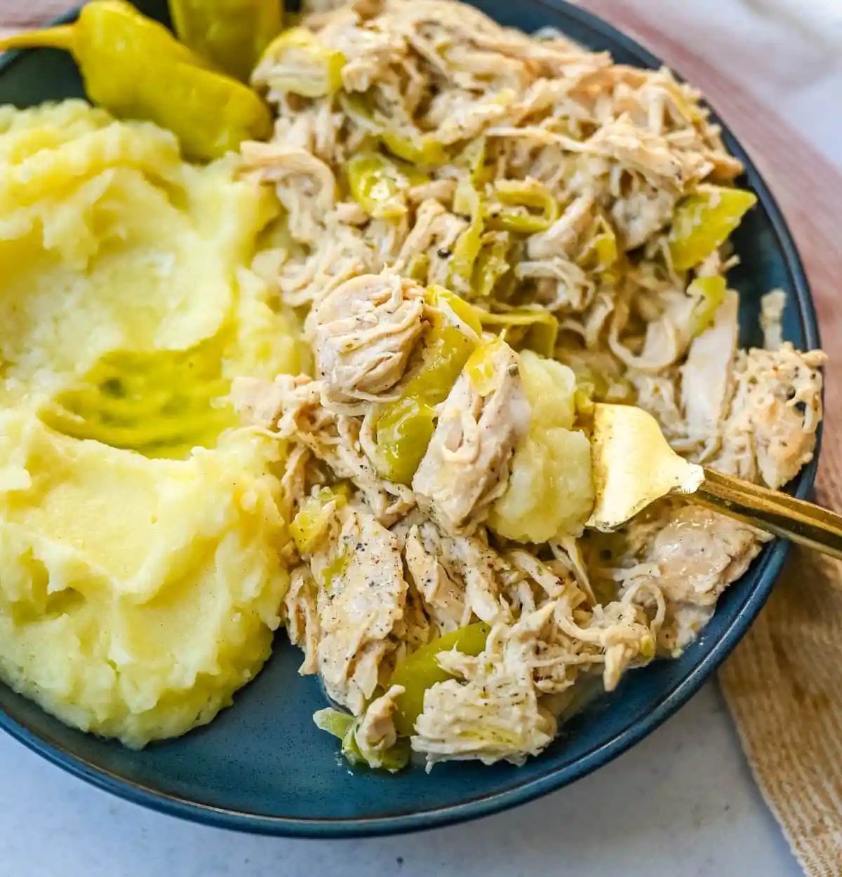 Looking for a new slow cooker chicken recipe? This Slow Cooker Boursin Chicken is rich, creamy, and packed with flavor thanks to garlic herb Boursin cheese, ranch seasoning, and pepperoncini's. The crockpot does all the work, giving you a perfectly tender chicken dinner recipe! You will love this Mississippi Chicken!