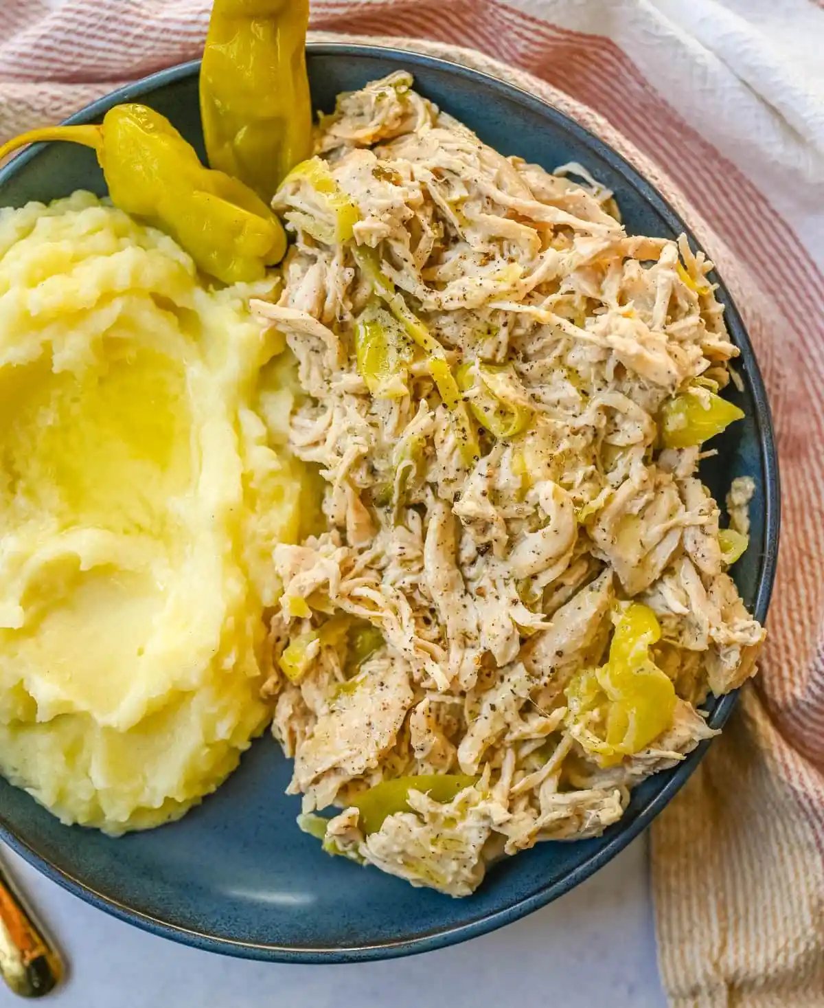 Looking for a new slow cooker chicken recipe? This Slow Cooker Boursin Chicken is rich, creamy, and packed with flavor thanks to garlic herb Boursin cheese, ranch seasoning, and pepperoncini's. The crockpot does all the work, giving you a perfectly tender chicken dinner recipe! You will love this Mississippi Chicken!