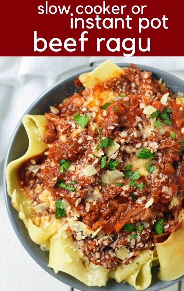 This braised shredded beef ragu with pappardelle pasta can be made in a slow cooker or instant pot pressure cooker. It makes the most tender, flavorful beef in a rich, velvety sauce. It is the ultimate comfort meal in a bowl! This Beef Ragu can be put on top of spiralized vegetables, mashed potatoes, or polenta for a gluten-free dinner. www.modernhoney.com