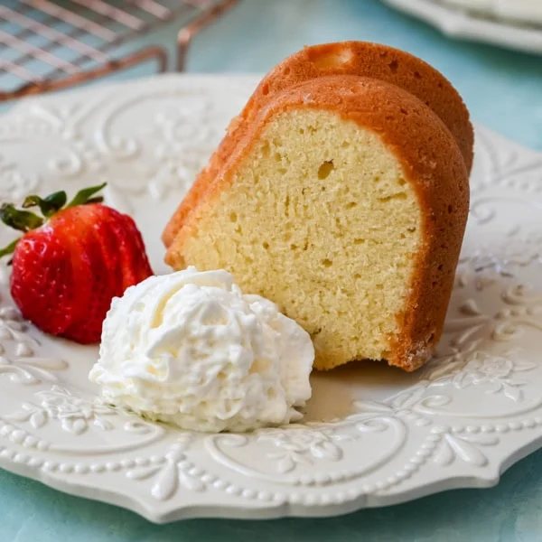 This classic sour cream pound cake is rich, buttery, and incredibly moist with a soft, tender crumb. This old-fashioned pound cake recipe delivers a dense yet velvety texture with the addition of sour cream, creating a cake that stays moist for days.