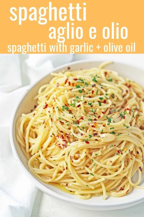 Spaghetti Aglio e Olio. Spaghetti tossed in sauteed garlic, olive oil, red pepper flakes, and fresh parsley. A quick and easy authentic pasta dish! Spaghetti with Garlic and Oil is 20 minute meal. www.modernhoney.com #pasta #spaghetti