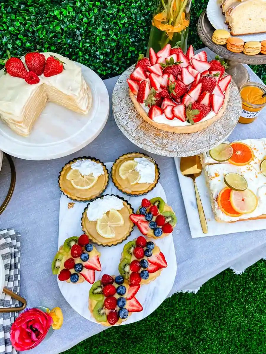Fruit Tarts, Lemon Cream Pie, Strawberry Tart, and Crepe Cake. How to create the Ultimate Spring Brunch or Spring Party with an assortment of both sweet and savory breakfast items and beautiful desserts. 30+ Spring and Easter Party Food Ideas. How to decorate for a Spring Brunch and Party too.