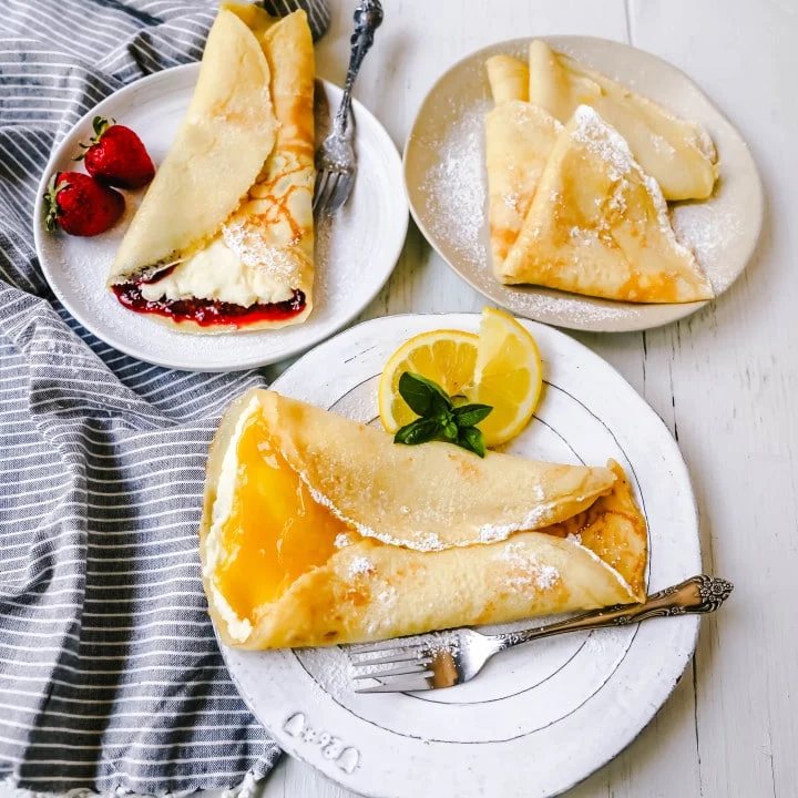 The Best Crepes Recipe. An easy homemade crepe recipe made with simple ingredients -- milk, flour, eggs, sugar, water, and butter. Simple 6-ingredient crepe recipe! #crepes #crepe #breakfast