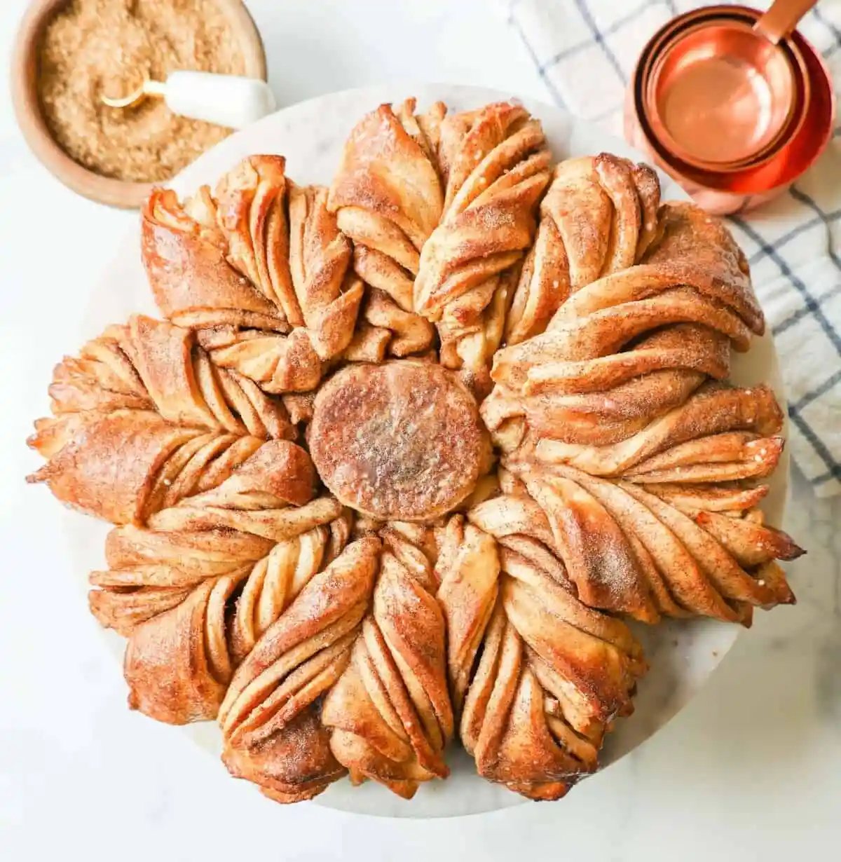 This Star Bread is a pull-apart bread that is perfectly soft and fluffy and filled with your favorite fillings. This is a Cinnamon Sugar Star Bread with layers of butter, cinnamon, and sugar, and shaped into a beautiful star.