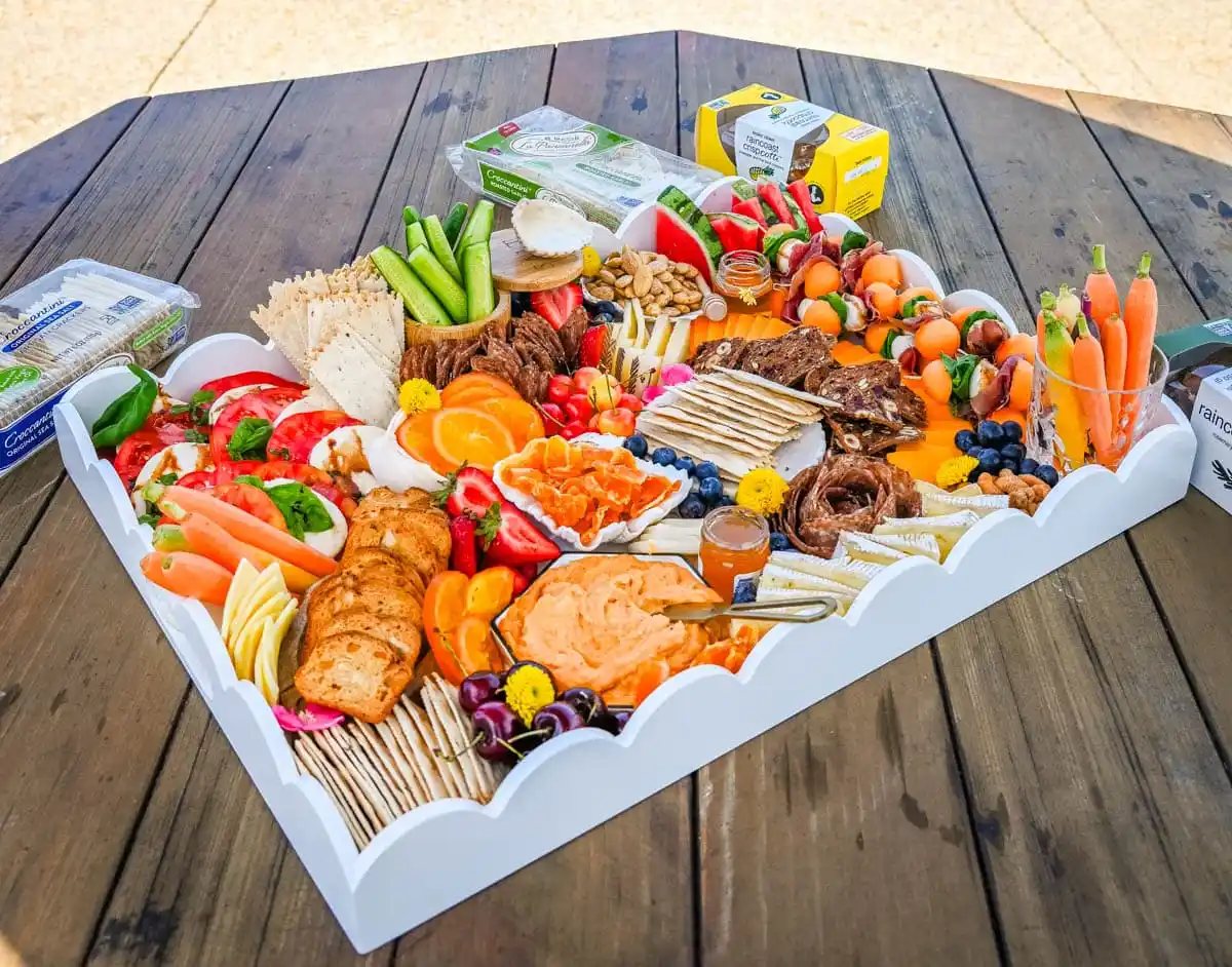 How to make an epic, beautiful Summer Charcuterie Board highlighting all of the fresh fruits and vegetables in season, paired with cheeses and meats perfect for summer. I am sharing all of the ideas on how to create the perfect charcuterie board for summer.