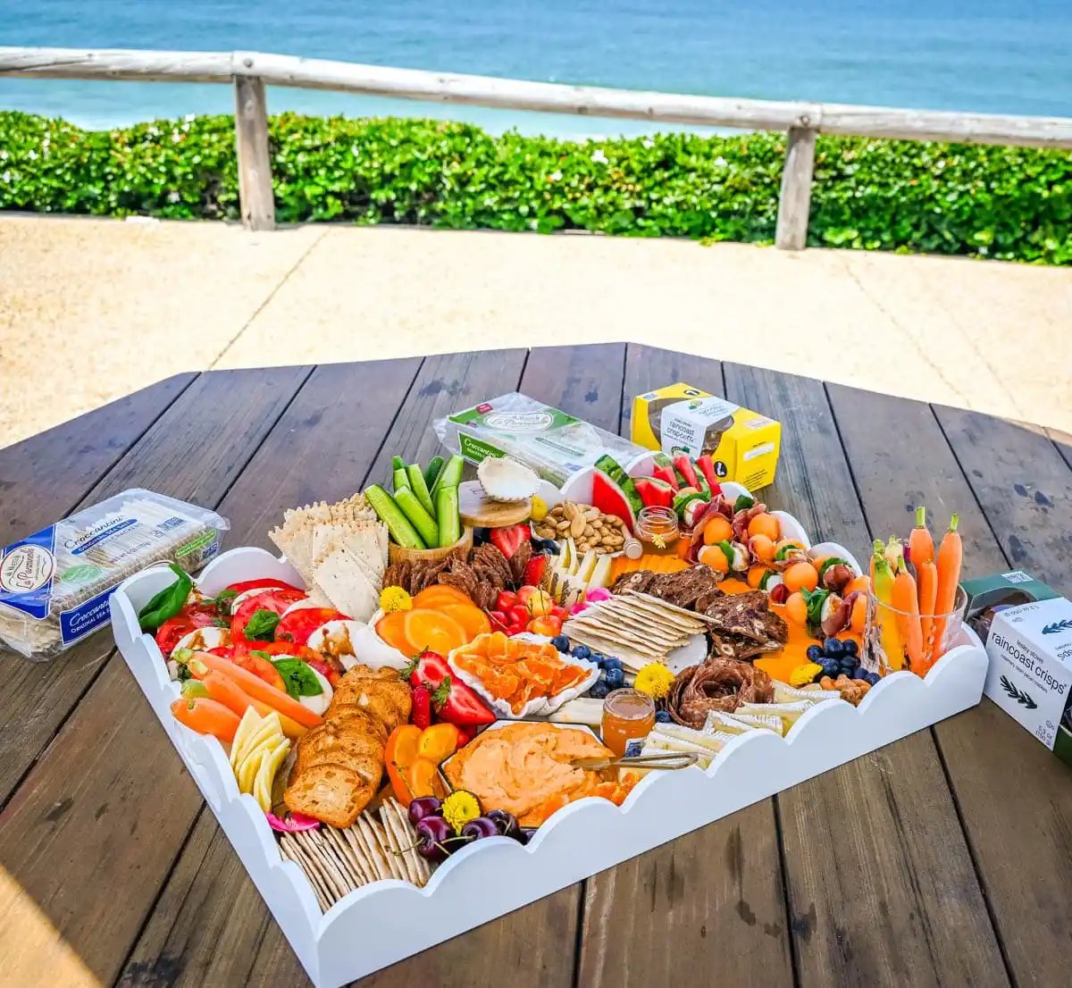 How to make an epic, beautiful Summer Charcuterie Board highlighting all of the fresh fruits and vegetables in season, paired with cheeses and meats perfect for summer. I am sharing all of the ideas on how to create the perfect charcuterie board for summer.