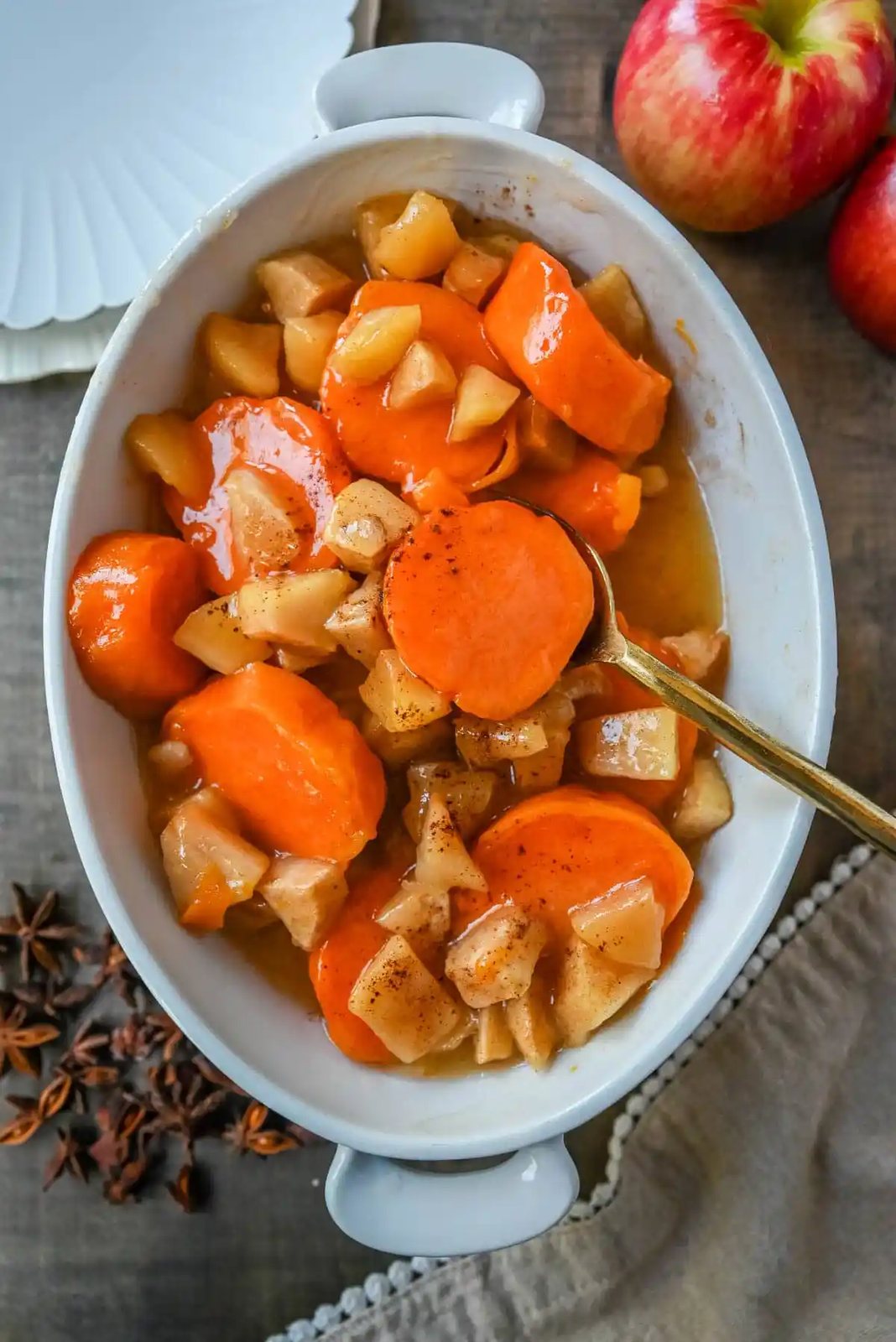 This Sweet Potatoes and Apples Recipe is mad with tender sweet potatoes and apples layered in a silky golden butter and sugar sauce that thickens into a glaze as it bakes. A timeless fall side dish everyone will love.