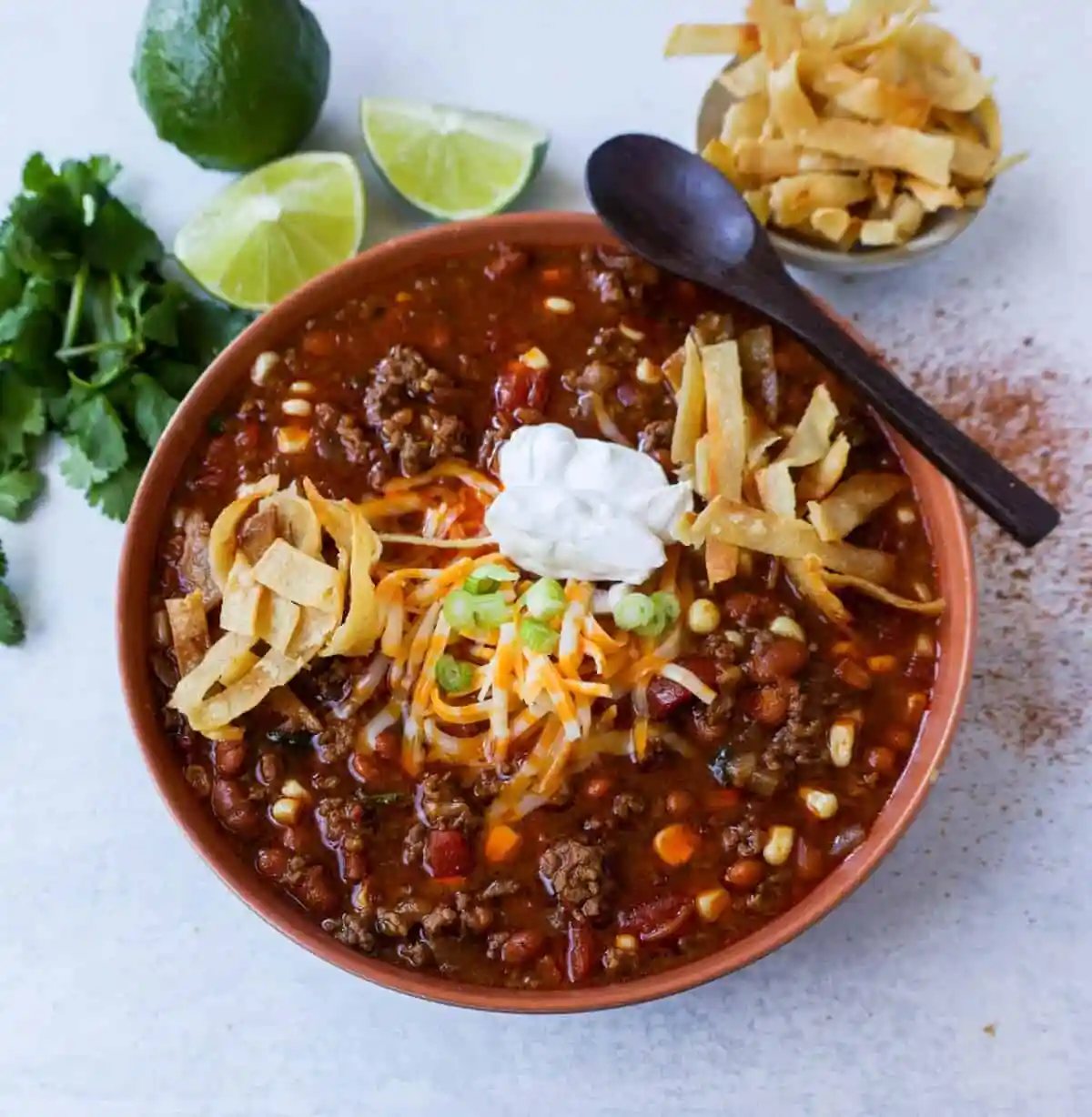 Quick and Easy 30-minute Taco Soup Recipe has all of the flavors of tacos made into a soup!