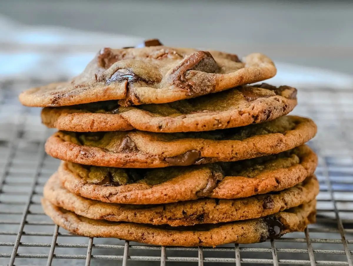 Are you team crispy or chewy? These thin and chewy chocolate chip cookies will win you over from the very first bite. Rich, buttery, and loaded with melty chocolate, these cookies are the perfect balance of crisp edges and soft, gooey centers. You are going to love these Thin and Chewy Chocolate Chip Cookies!