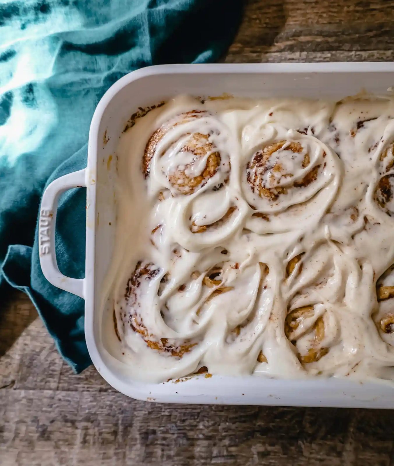 The famous, viral TikTok Cinnamon Rolls with heavy cream are even better than Cinnabon! These TikTok Cinnamon Rolls made with canned cinnamon rolls, a homemade buttery cinnamon drizzle, and a cream cheese frosting are the easiest cinnamon rolls you will ever make!