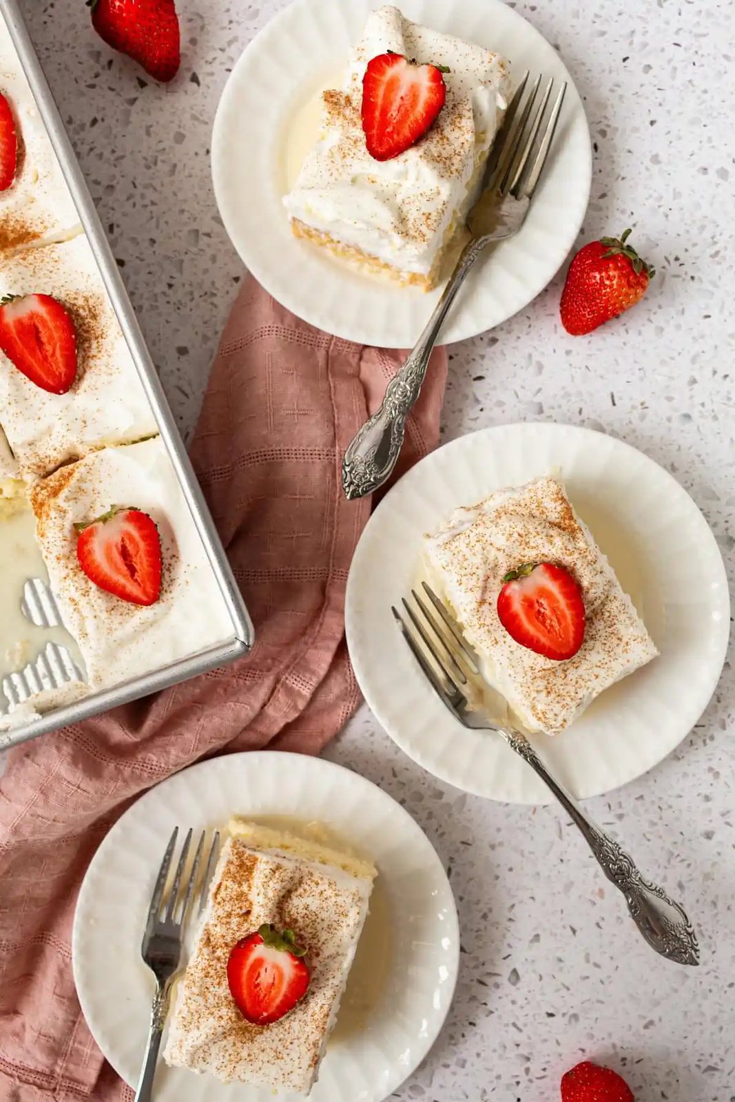 Tres Leches Cake. A classic Mexican dessert made with a vanilla sponge cake soaked with three kinds of milk -- heavy cream, evaporated milk and sweetened condensed milk and topped with fresh sweetened whipped cream. An authentic Mexican dessert recipe!