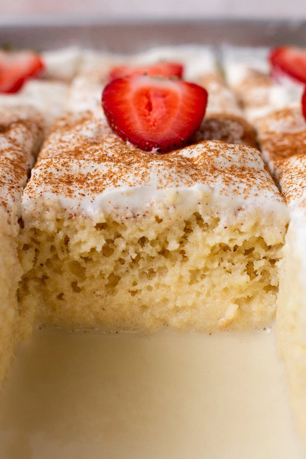 Tres Leches Cake. A classic Mexican dessert made with a vanilla sponge cake soaked with three kinds of milk -- heavy cream, evaporated milk and sweetened condensed milk and topped with fresh sweetened whipped cream. An authentic Mexican dessert recipe!