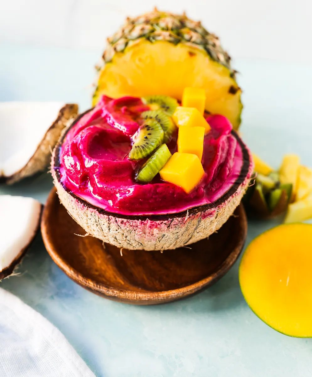 Dragon fruit (pitaya) smoothie bowls are a creamy frozen blend of tropical fruits topped with granolas, seeds, and other toppings that will give you healthy energy throughout the day.