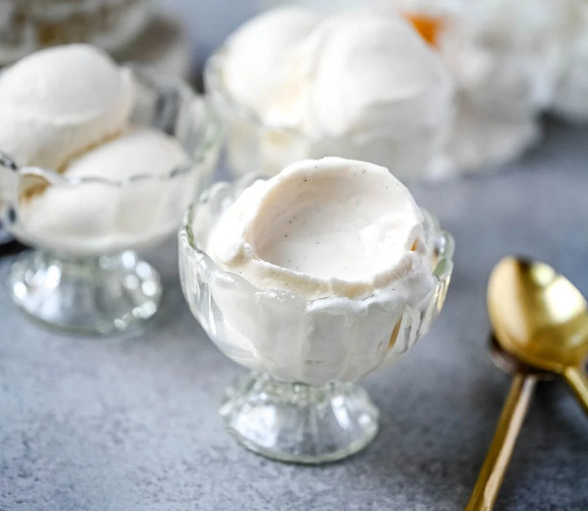 This Vanilla Bean Gelato (also known as Fior de Latte Gelato) is a homemade gelato recipe and is the ultimate summer dessert made with real vanilla beans and a custard base for that authentic gelato texture. This from-scratch vanilla bean gelato is better than store-bought and easier to make than you think...it is rich, creamy, and full of vanilla flavor.
