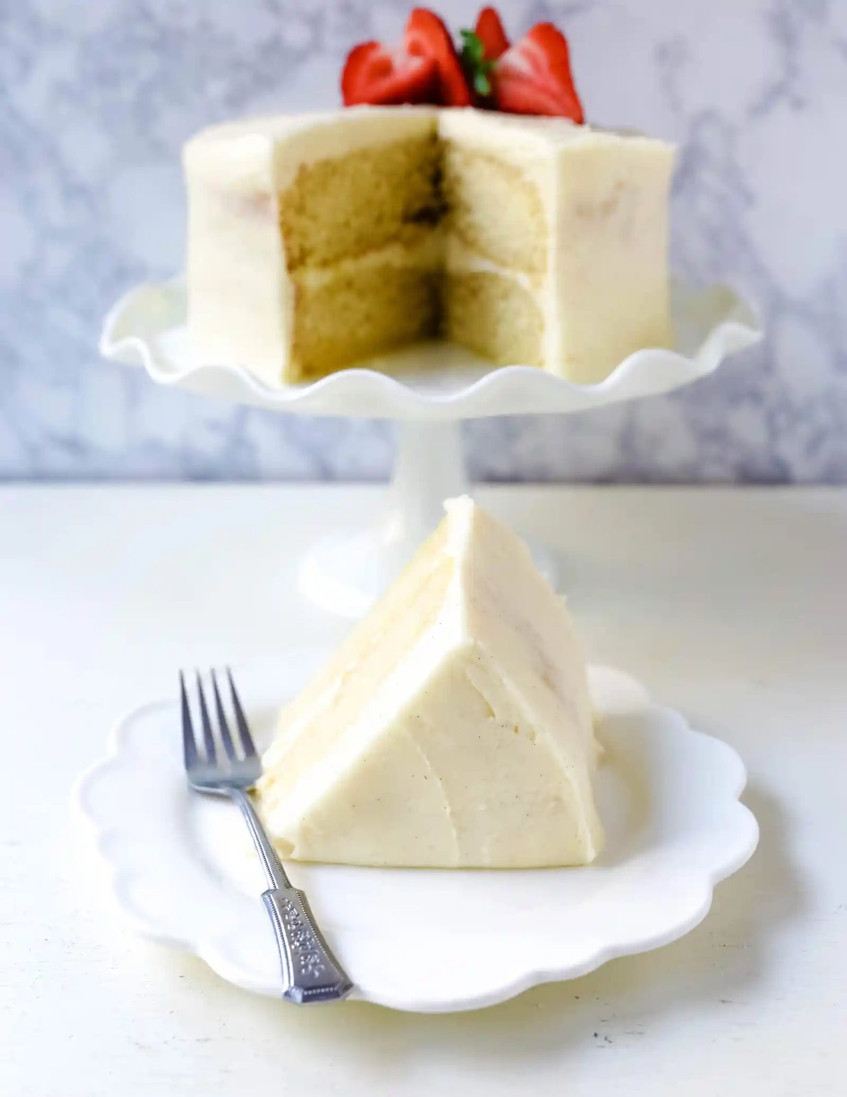 Vanilla Cake Recipe. The best homemade vanilla cake recipe with vanilla bean buttercream frosting. www.modernhoney.com #vanillacake #cake #cakerecipe #vanillacakerecipe